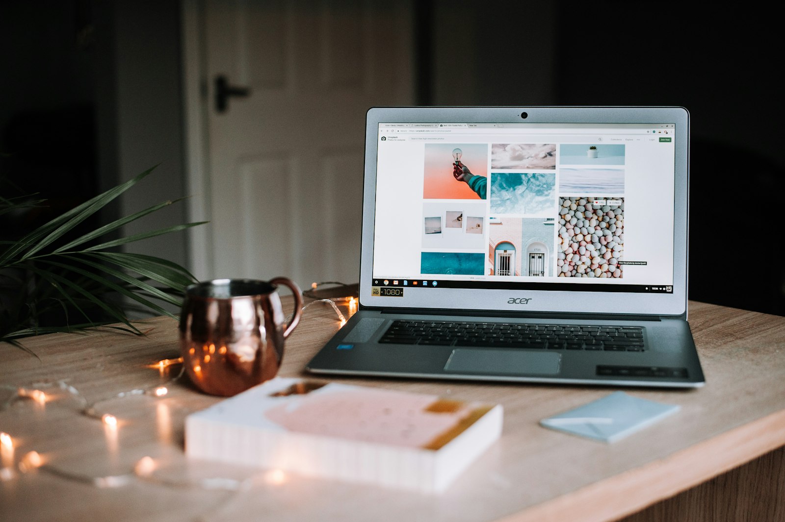 A travel advisor working at a laptop with a coffee, planning client trips efficiently